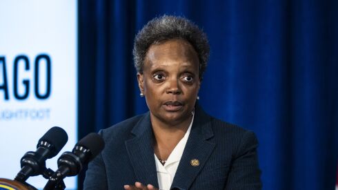 Mayor Lori Lightfoot discusses gun violence prevention efforts in Chicago during a news conference at City Hall in the Loop, Tuesday afternoon, Aug. 23, 2022.