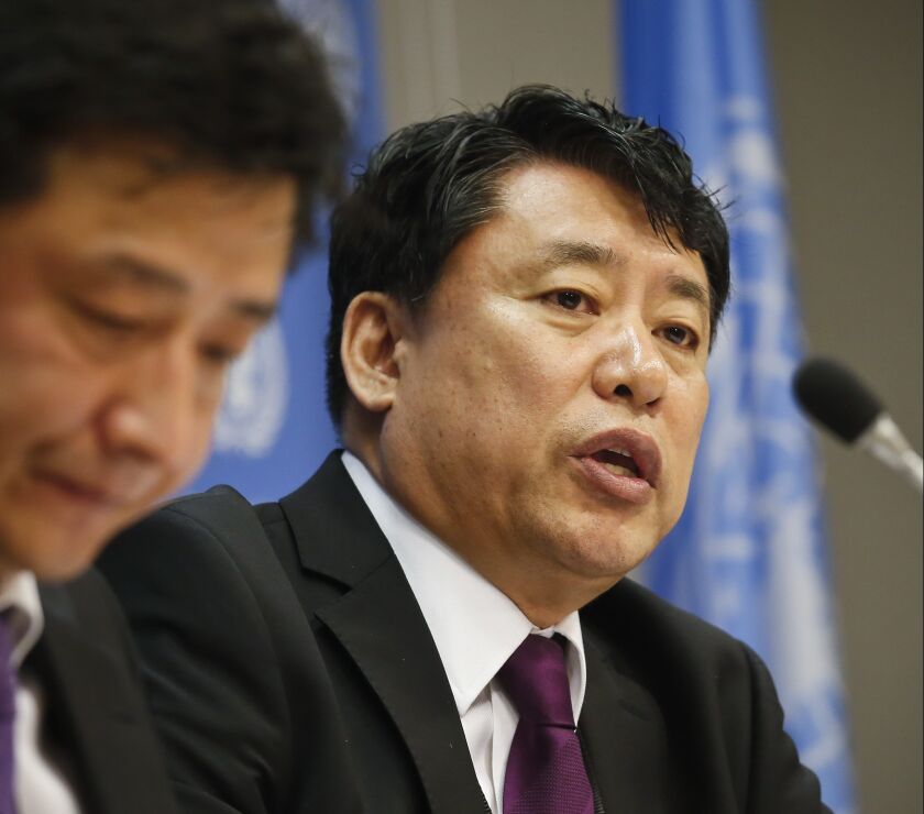 North Korea Deputy United Nations Ambassador Kim In Ryong (right) speaks during a news briefing, Monday at U.N. headquarters. | Bebeto Matthews/Associated Press