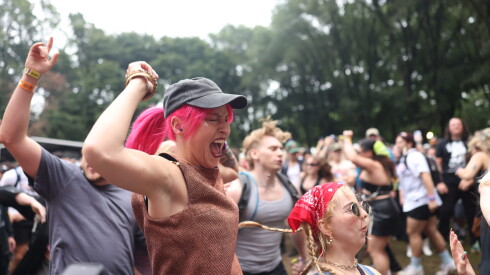 Die Spitz fans do circle pits near the Airbnb stage on Day 3 of Lollapalooza in Grant Park.