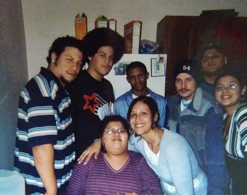A teenaged Samuel Jimenez (in T-shirt with star on it) with his family members | Provided