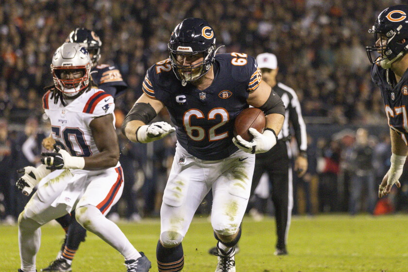 Chicago Bears offensive lineman Joe Thuney #62 runs with the ball during the second quarter against the New England Patriots at Soldier Field, Thursday, Oct. 22, 2026. | Ashlee Rezin/Sun-Times