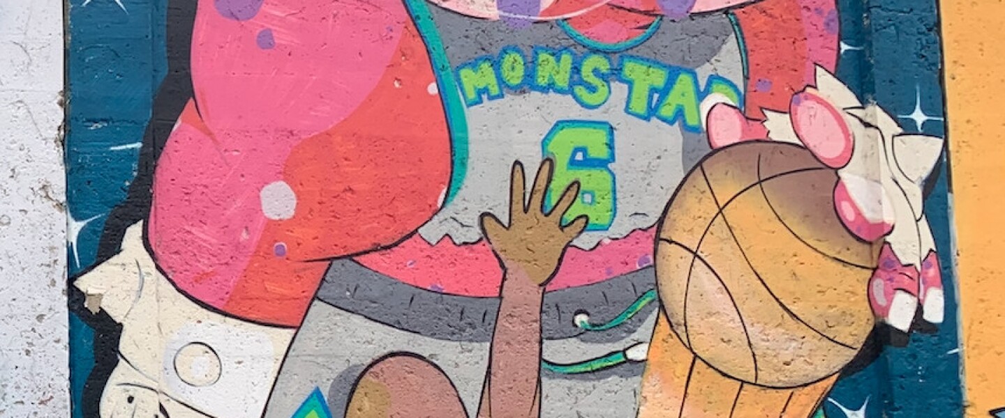 This mural, featuring characters from the movie “Space Jam,” was a nod to Bulls great Michael Jordan. It was painted by 28-year-old Humboldt Park artist who goes by Ali Six.