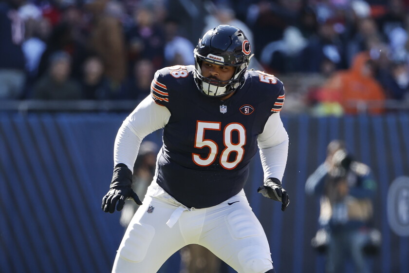 Chicago Bears offensive tackle Darnell Wright (58) blocks against the Las Vegas Raiders during the first half of an NFL football game, Sunday, Oct. 22, 2023, in Chicago. (AP Photo/Kamil Krzaczynski)