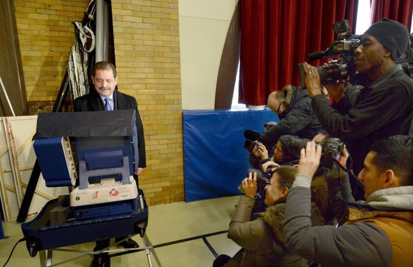 Jesus “Chuy” Garcia votes at his polling place on election day. Tuesday, February 24, 2015 | Brian Jackson/ Sun-Times