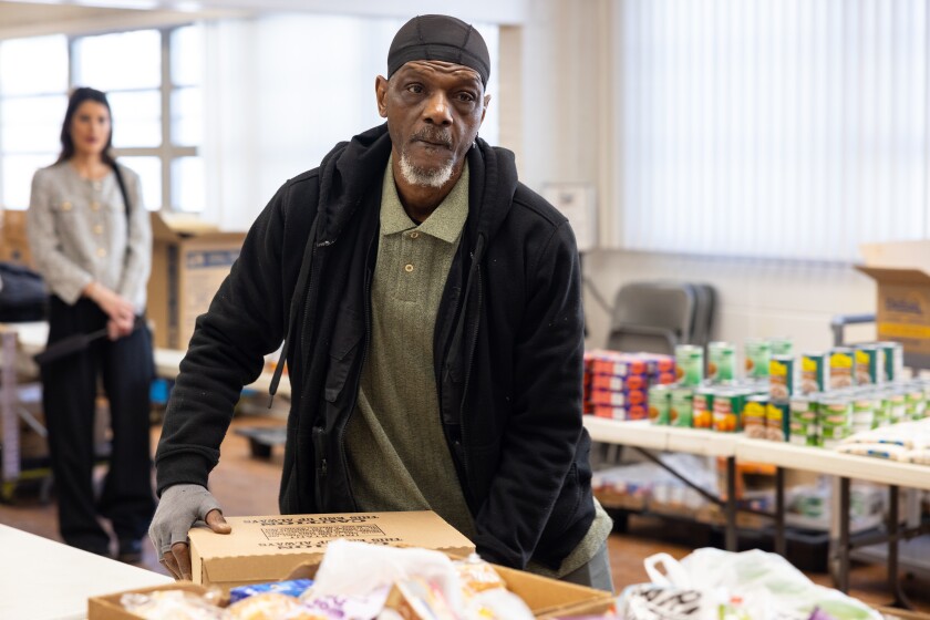 Volunteer Kenny Robinson, Sr. packs boxes at the Chosen Bethel Family Ministries Bread of Life Food Pantry in Englewood on the South Side, Monday, Jan. 26, 2026. | Candace Dane Chambers/Sun-Times.