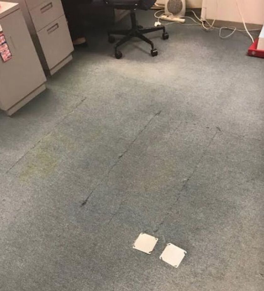 Carpeting in a 16th-floor office in the Thompson Center before it was replaced.