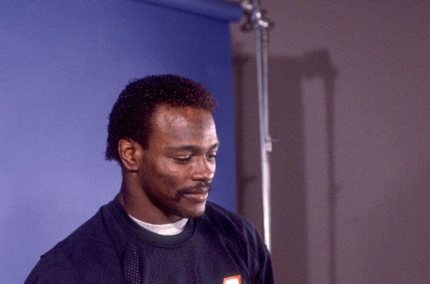 Bears Hall of Fame running back Walter Payton reads over his script during filming of the Super Bowl Shuffle.