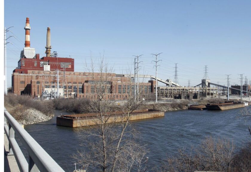 The Crawford Generating Station, a coal-fired power plant in Chicago, has been shut down and the site has been sold. But some nearby residents feel left out of the process for deciding what to do with the site. | M. Spencer Green/Associated Press