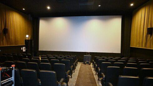 An empty auditorium screen from the rear seating area at The 400 Theater on Friday, July 24, 2026, in Chicago. Located at 6740 N. Sheridan Rd. in the Rogers Park neighborhood.