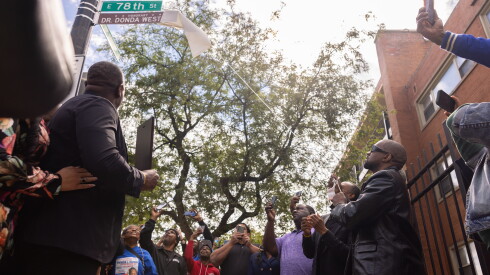 Ye, formerly Kanye, unveils a street sign honoring his late mother Dr. Donda West at a dedication ceremony in South Shore on the South Side, Tuesday, Sept. 22, 2026.