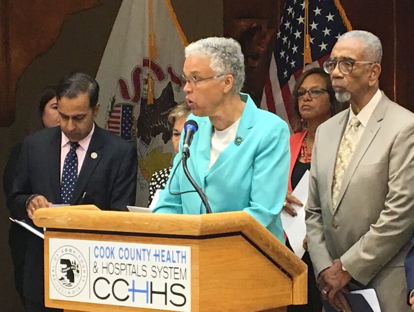 Cook County Board President Toni Preckwinkle, joined by several members of Congress, including (from left) Raja Krishnamoorthi, Robin Kelly and Bobby Rush, at a news conference last year.