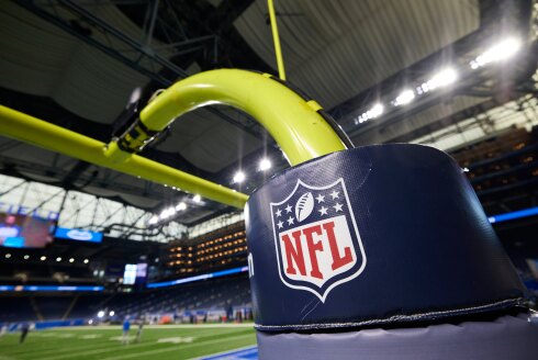 In this Aug. 13, 2021, file photo, an NFL logo is displayed on a goal post pad during an NFL preseason football game between the Buffalo Bills and Detroit Lions in Detroit.