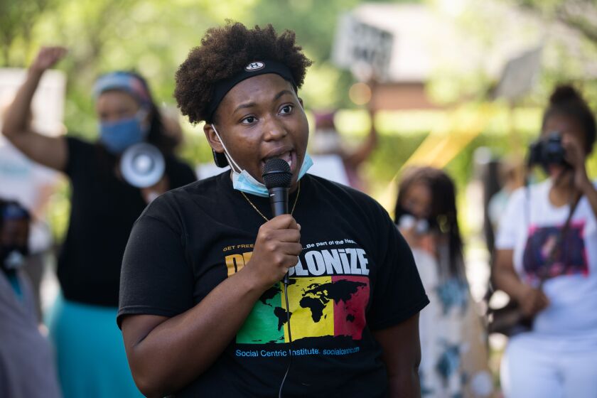 Khari Rayfield, 19 speaks at a racial justice rally Friday afternoon July 31, 2020 after her mother LaShandra Smith-Rayfield confronted a group of white people displaying a Confederate flag at the beach Wednesday. | Pat Nabong/Sun-Times