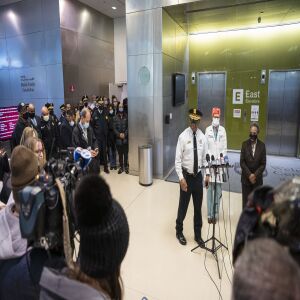 Mayor Lori Lightfoot listens as Chicago Police Supt. David Brown gives the media an update on an officer’s condition and investigation after the shooting of the off-duty police officer at the University of Chicago Medical Center in Hyde Park, Monday afternoon, March 15, 2021.
