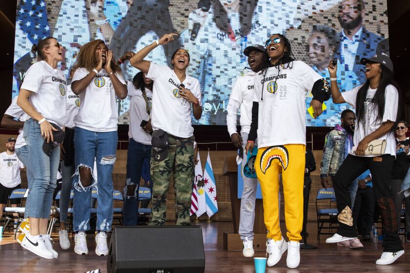 Chicago Sky players celebrate their WNBA Championship title Tuesday at Pritzker Pavilion.
