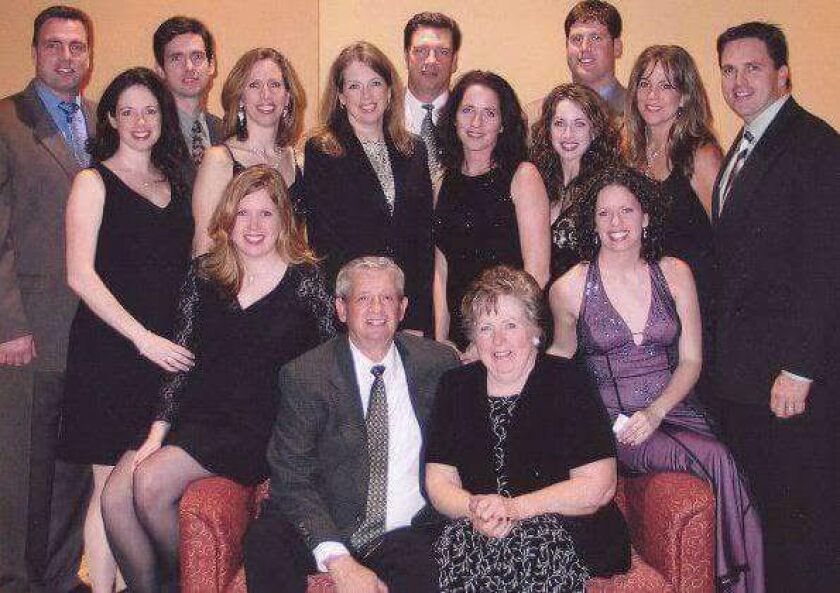 Tommy Gardiner (center rear) and his 12 siblings and mother and father, Mary and Thomas. | Provided photo