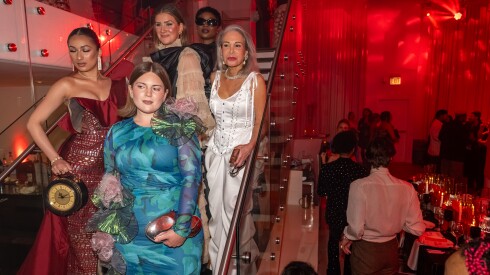Dozens attend the Chicago Fashion Coalition’s living fashion exhibition and watch party of the Met Gala at Chez in the Streeterville neighborhood, Monday, May 4, 2026.