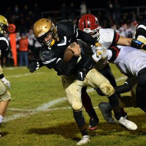 Richards senior Sebastian Castro (2) tries to gain a first down. Worsom Robinson/For the Sun-Times.