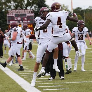 Montini’s Matthew Ross (4) and Mark Gabriel (2) celebrate. Allen Cunningham/For the Sun-Times.