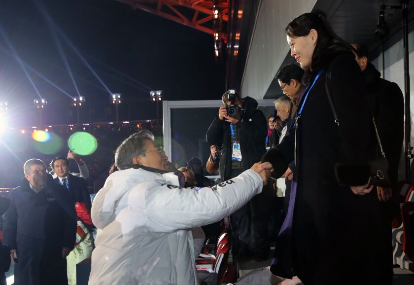 South Korean President Moon Jae-in, left, shakes hands with North Korean leader Kim Jong Un’s younger sister Kim Yo Jong during the opening ceremony of the 2018 Winter Olympics in Pyeongchang, South Korea, Friday, Feb. 9, 2018. (Kim Ju-sung/Yonhap via AP)
