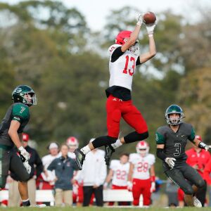 Hinsdale Central’s Braden Contreras (13) catches a pass during the game against Glenbard West.