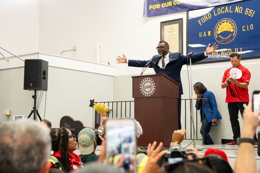 Chicago Mayor Brandon Johnson speaks during a rally Saturday for striking members of the United Auto Workers union.