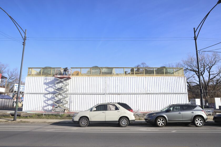 Eight storage containers on South King Drive will be the home for Pastor Corey Brooks for 100 days. Four tents, one for Brooks, one for guests, one for supplies and one for media are clustered atop the containers.