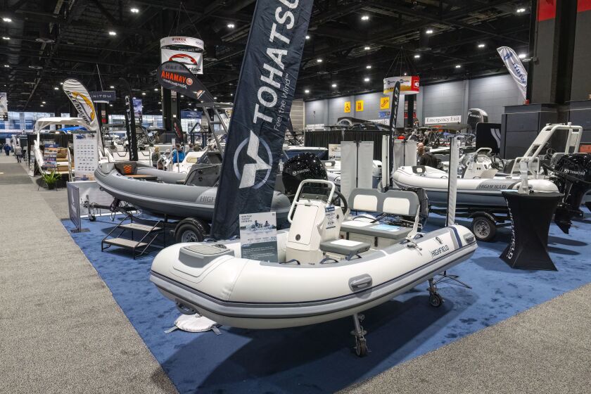 Some of the watercraft on display at the Tohatsu vendor stall at the Chicago Boat Show at McCormick Place