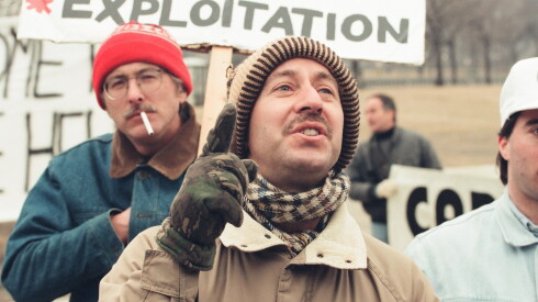 Steve Hindi during a past protest with the Animal Rights Coalition, talking with people waiting in line for tickets at the Shedd Aquarium.