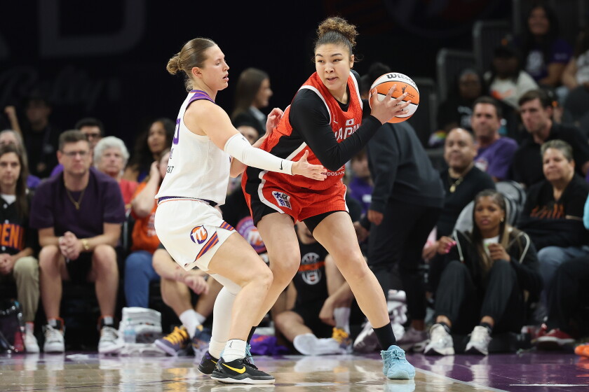 PHOENIX, ARIZONA - APRIL 29: Azusa Asahina #14 of the Team Japan looks to pass around Morgan Maly #30 of the Phoenix Mercury during the second half of an exhibition WNBA game at Mortgage Matchup Center on April 29, 2026 in Phoenix, Arizona. (Photo by Christian Petersen/Getty Images) ORG XMIT: 776484073
