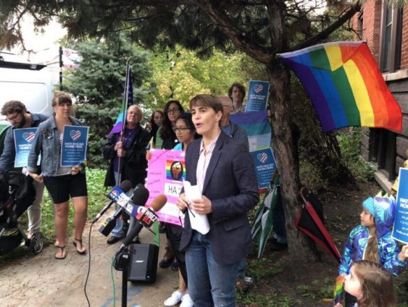 Ald. Deb Mell (33rd) speaks at a demonstration across the street from Resurrection Catholic Church on Wednesday, days after the Rev. Paul Kalchik burned a rainbow-cross flag on church grounds. | Mitchell Armentrout/Sun-Times