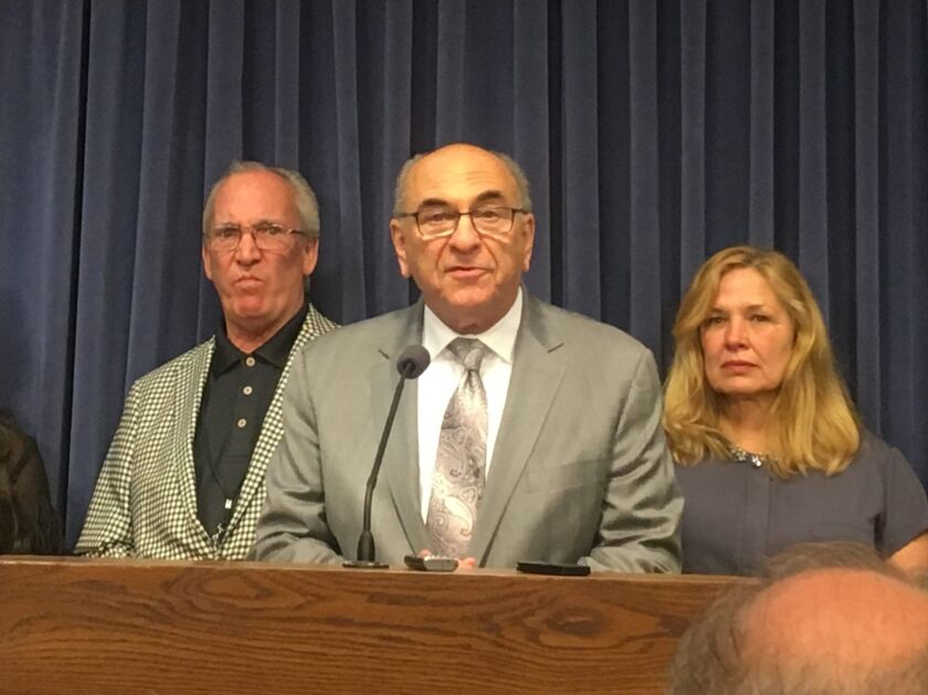 State Rep. Lou Lang speaks at a Springfield news conference. File Photo.