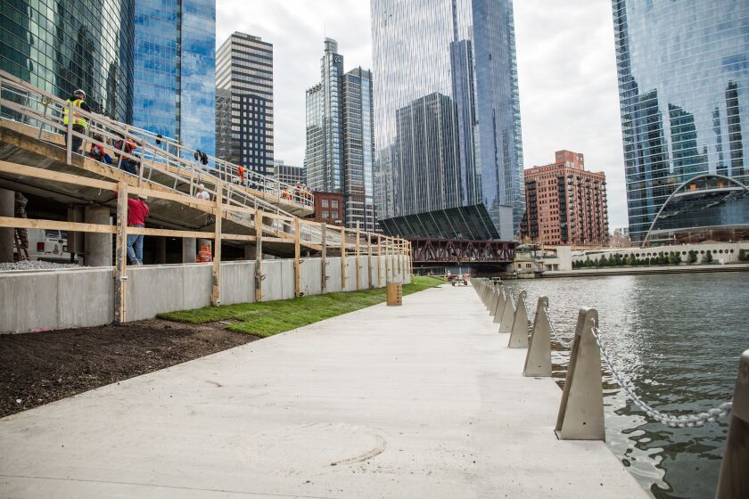 Work continued Wednesday on a ramp near Franklin Street, part of the final phase of the Riverwalk. | Santiago Covarrubias/Sun-Times