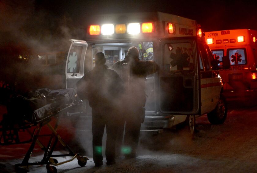 A firefighter was injured after slipping and injuring his back while battling a fire in the 16400 block of Emerald Avenue in Harvey. | Justin Jackson/ Chicago Sun-Times