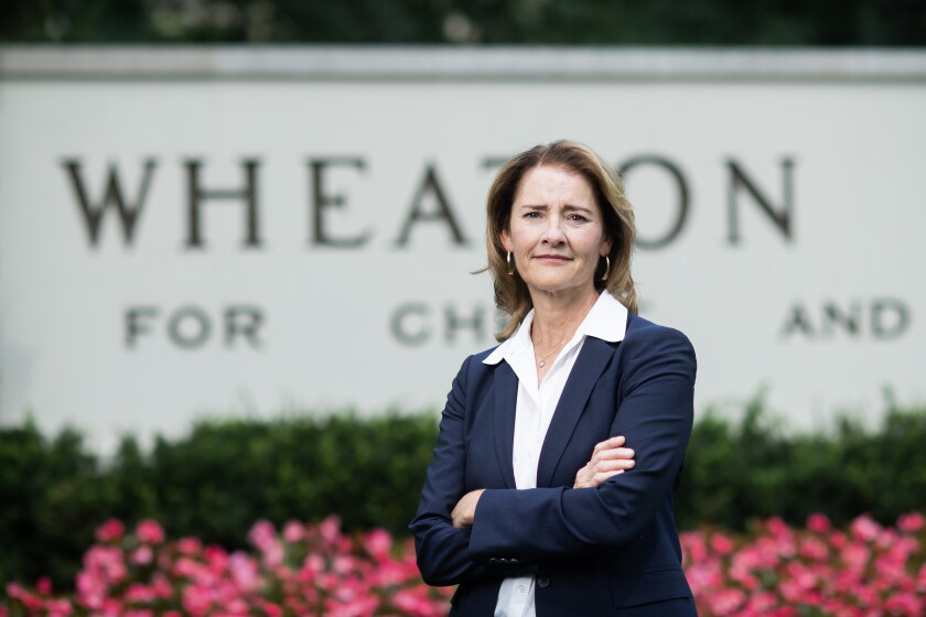 Julie Roys, founder of Roys Report, is shown recently outside Wheaton College.
