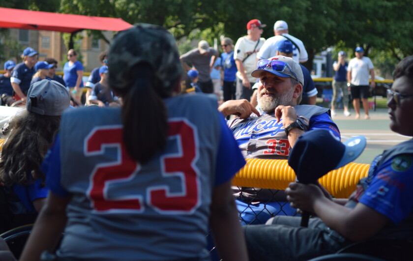 Dan Ferreira, coach of the Chicago Junior Wheelchair Cubs and adaptive sports and event coordinator for the Chicago Park District, talks to his team after the 2025 Wheelchair Softball Junior World Series at California Park Saturday, August 2, 2025.