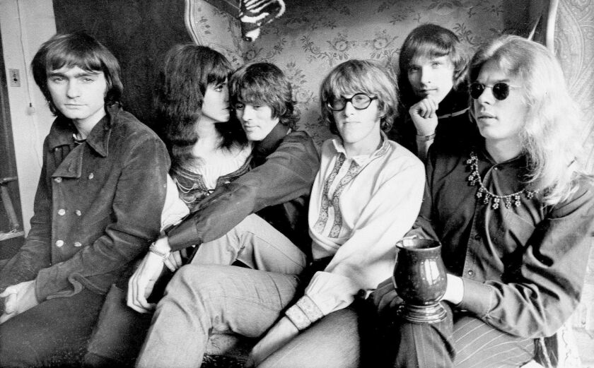 This Dec. 5, 1968 file photo shows the rock band Jefferson Airplane, Marty Balin (from left), Grace Slick, Spencer Dryden, Paul Kantner, Jorma Kaukonen and Jack Casady, as they pose in their Pacific Heights, San Francisco apartment. | AP Photo, File