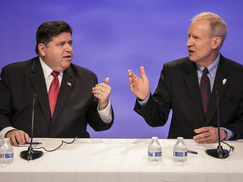 Republican Gov. Bruce Rauner, right, and his Democratic challenger J.B. Pritzker faced-off in a debate in Chicago before the Sun-Times Editorial Board. (Rich Hein/Chicago Sun-Times via AP File) ORG XMIT: ILCHS301