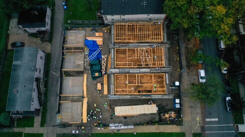 An overhead view of a construction site in West Pullman where three affordable housing units are being built by Habitat for Humanity Chicago volunteers. Anthony Jackson/ For the Sun-Times