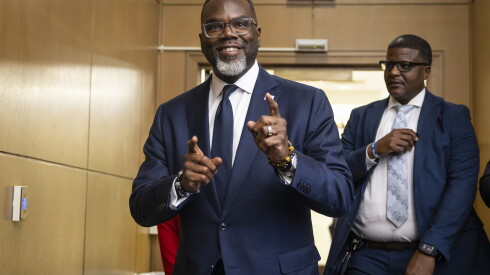 Mayor Brandon Johnson greets photographers as he enters chambers to preside over a Chicago City Council meeting at City Hall, Wednesday, Sept. 23, 2026.