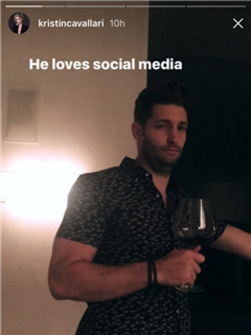 Jay Cutler sipping red wine in Kristin Cavallari’s Instagram story. | Kristin Cavallari/Instagram via 247 Sports