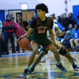 Morgan Park’s Deshawndre Washington (24) shakes off a defender, Thursday 01-24-19. Worsom Robinson/For the Sun-Times.