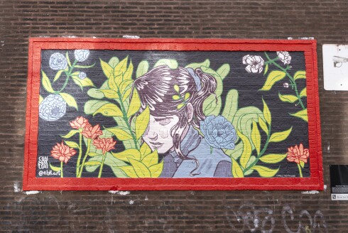 Kyle Brand's mural “Regrowth” is on a building at West Wilson and North Clifton avenues in Uptown.