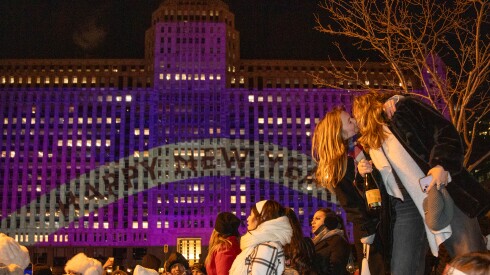New Year's Eve revelers kiss during Dick Clark’s New Year’s Rockin’ Eve near the Chicago Riverwalk, Thursday, Jan. 1, 2026.