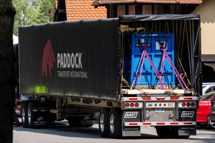 One of the trucks, holding a blue water tank, in which beluga whales were to be transported from the now-closed Marineland in Niagara Falls, Canada. Several of the whales were removed from by a group of experts from Marineland and several U.S. aquariums on Monday, July 20, 2026.