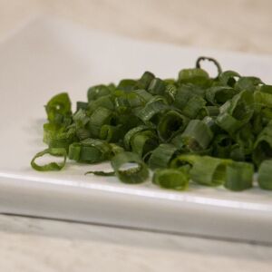 Chopped scallions are sprinkled on the Chinese rice stuffing for a finishing touch. | Ashlee Rezin/Sun-Times