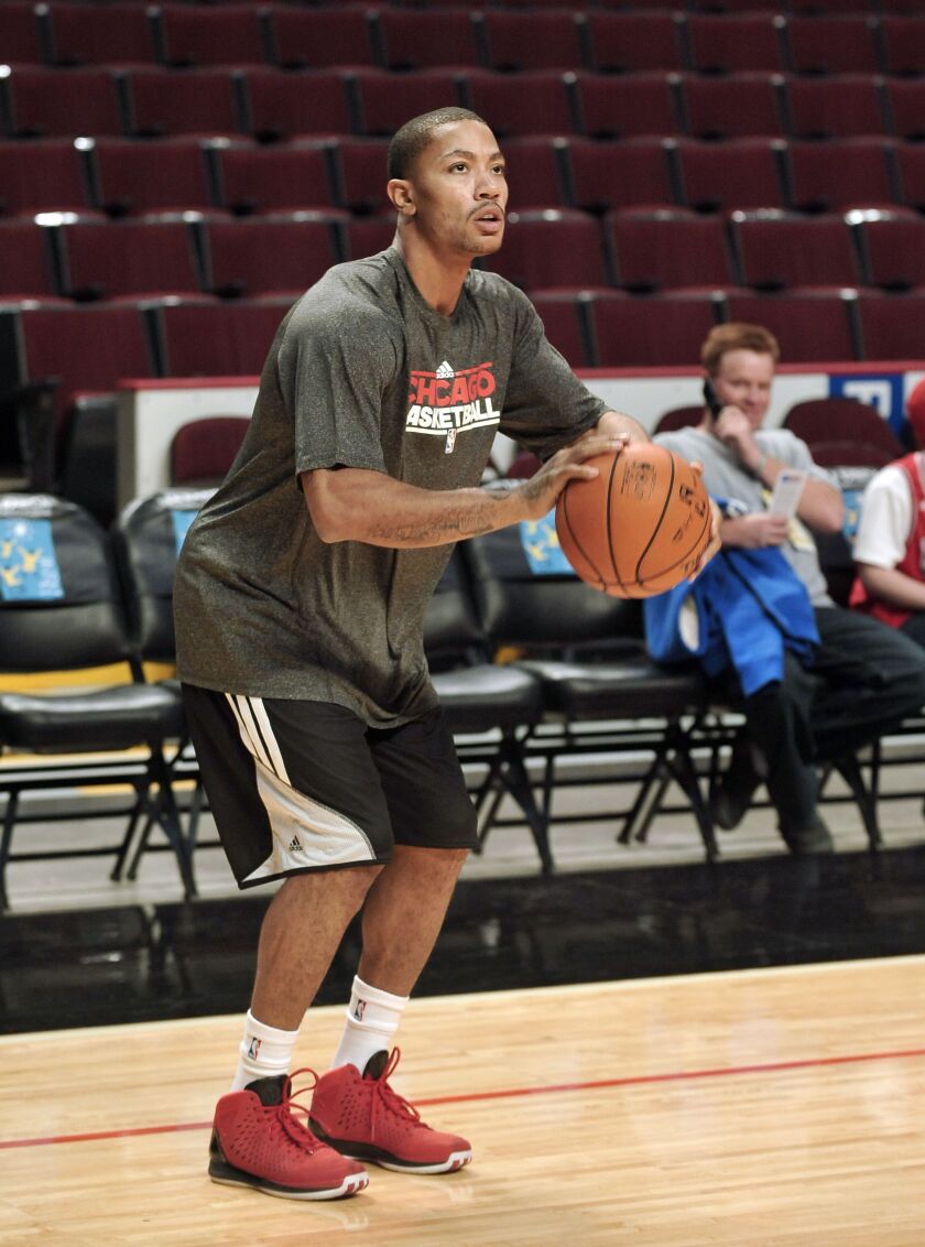 Injured Bulls guard Derrick Rose worksout for a brief time before the Chicago Bulls take on the Milwaukee Bucks on October 16, 2012 at the United Center. Rose sat out this entire season after knee surgery. | Tom Cruze/Sun-Times