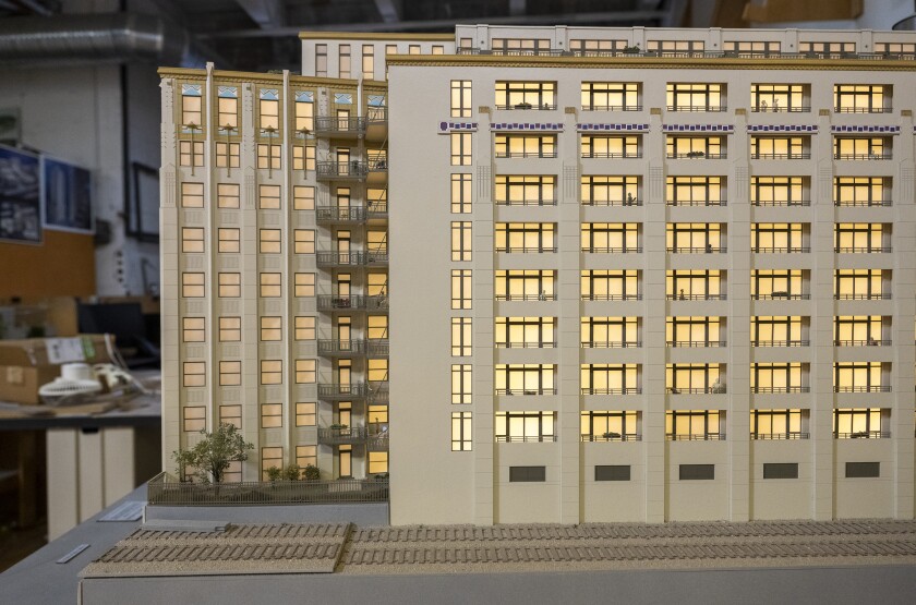 A model of the condo building University Station in Near West Side at the workshop of Columbian Model & Exhibit Works in the West Loop.