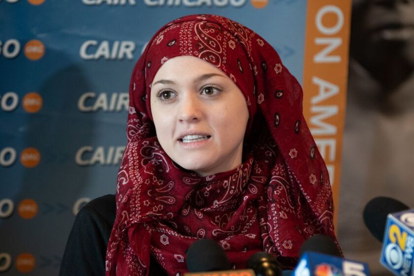 Syrian/American Activist Amal Kassir speaks at a press conference following the Supreme Court’s decision on upholding the travel ban. | Colin Boyle/Sun-Times