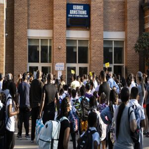 Parents and students arrive at George Armstrong Elementary School, 2110 W. Greenleaf Ave. in Rogers Park, for the first day of school for Chicago Public Schools, Monday morning, Aug. 30, 2021.